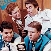 Publicity still from the television series "Happy Days" (1974-84) with (clockwise from lower left) Anson Williams, Don Most, Henry Winkler, and Ron Howard.